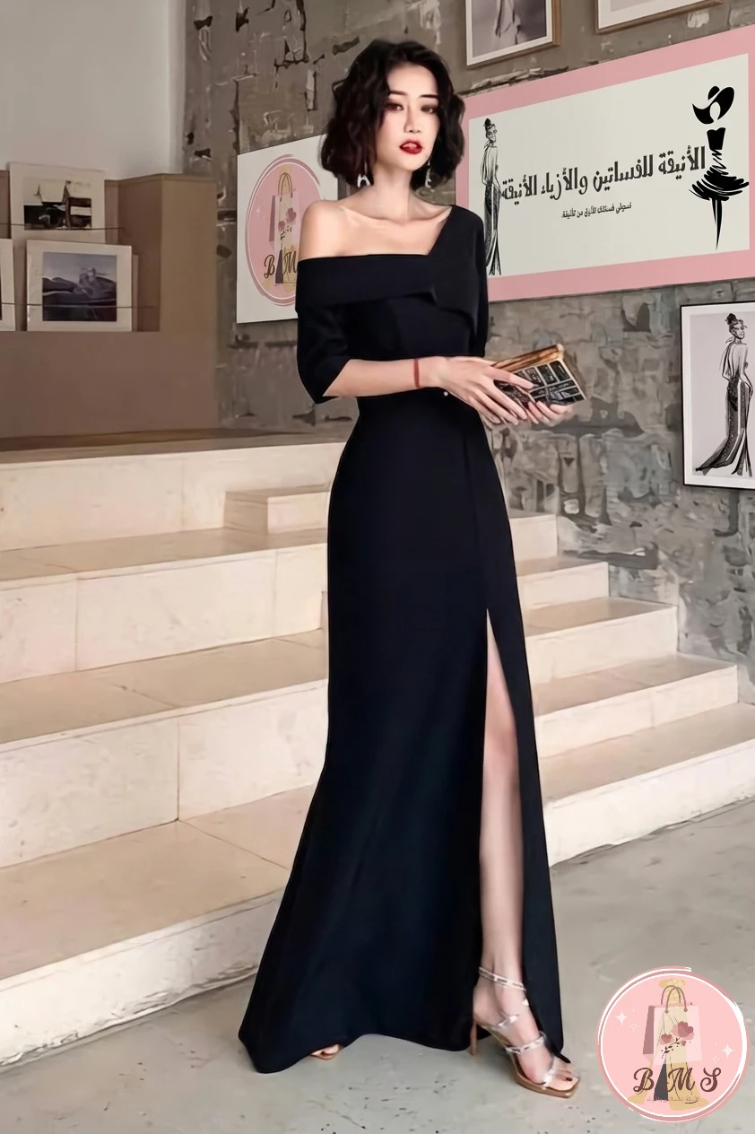 ​العنوان: فستان "النجمة السوداء" بكتف مكشوف وفتحة جانبيّة